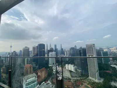a view of a city from the top of a skyscraper at Agile Sky Pavilion Homestay Bukit Bintang KL in Kuala Lumpur