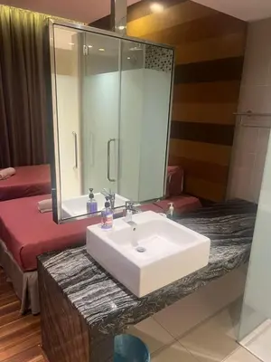 a bathroom with a sink and a mirror at D Majestic hosted by Super Tang in Kuala Lumpur