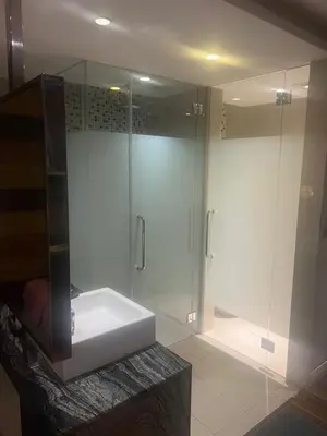 a bathroom with a shower and a white sink at D Majestic hosted by Super Tang in Kuala Lumpur