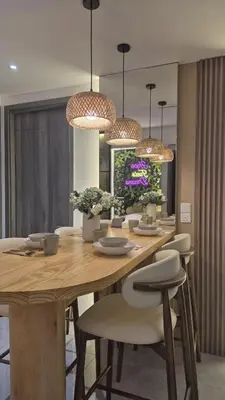 a dining room with a wooden table and chairs at Nature Home Agile Bukit Bintang TRX Pavillion Nice View Free Netflix #3 in Kuala Lumpur