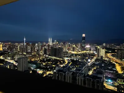 a view of a city at night at Trion Dream house KL City in Kuala Lumpur