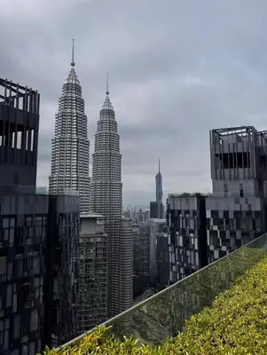 a view of a city skyline with tall buildings at luxury One Bedroom KLCC in Kuala Lumpur