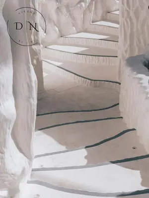 a white couch with its shadows on the floor at ARTE Mont Kiara Modern Sanctuary Jacuzzi in Kuala Lumpur