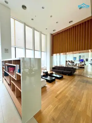 a living room with a couch and a table at Platinum Suites KLCC by Dream'Inn in Kuala Lumpur