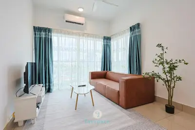 a living room with a brown couch and a tv at Chan Sow Lin - Cozy 3B3B - 6 pax - F&B & Mart in Kuala Lumpur