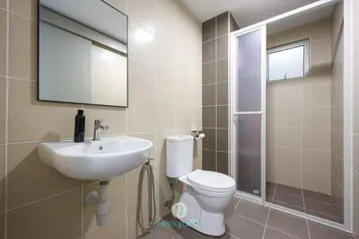a bathroom with a toilet and a sink and a mirror at Chan Sow Lin - Cozy 3B3B - 6 pax - F&B & Mart in Kuala Lumpur