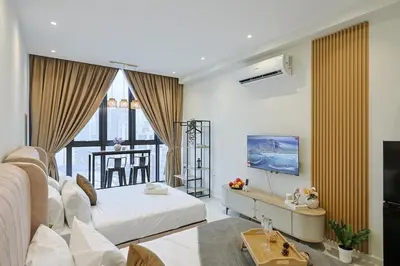 a living room with a bed and a large window at Majestic Residence near KLCC Quill City 2 in Kuala Lumpur