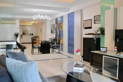 a living room with a couch and a table at 3BR at Holiday Place Kuala Lumpur 5 mins to KLCC & MRT in Kuala Lumpur