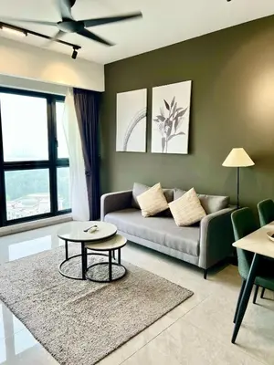 a living room with a couch and a table at Residence Agile Apartment at kulalampur in Kuala Lumpur