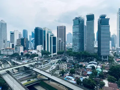 a city with tall buildings and a highway at Summer Suites KLCC by Vho'Z in Kuala Lumpur