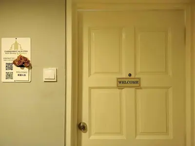 a door with a sign that says walk out at Fahrenheit88 Suites Bukit Bintang A 2R in Kuala Lumpur