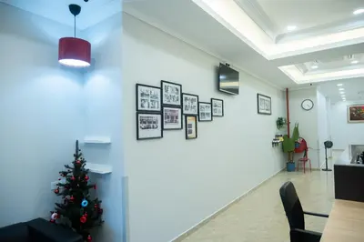 a room with a christmas tree on the wall at Alami Garden Hotel Kuala Lumpur in Kuala Lumpur