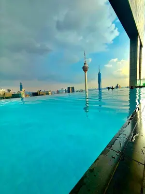 a swimming pool with a view of the city at Platinum Suites in Kualalumpur City Center in Kuala Lumpur