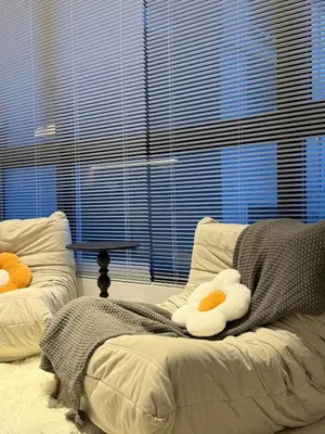 two towels on a bed in front of a window at CherasCochrane walkto MRT Near TRX, KLCC, pavilion in Kuala Lumpur