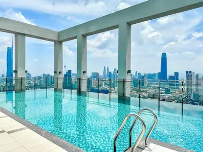 a swimming pool with a view of the city at Trion 2 KL Cityview Suites by CityNest in Kuala Lumpur