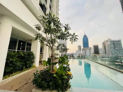 a view of the city from the rooftop of a building at Quill KLCC By Signature in Kuala Lumpur