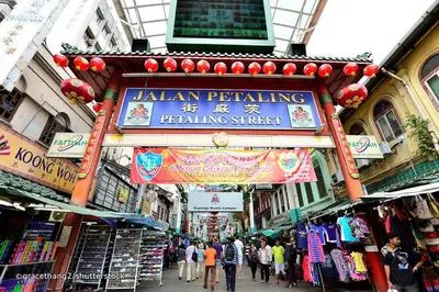 a sign for a jalan penketuing shop in a street at High-Floor Suasana KL Stay Cozy & Central in Kuala Lumpur