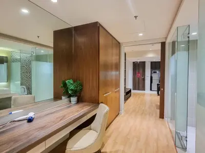 a bathroom with a wooden counter and a mirror at KL City Designer Studio in D Majestic near LRT and Lalaport CityNest in Kuala Lumpur