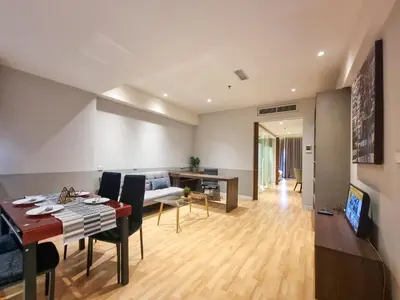 a living room with a table and a dining room at KL City Designer Studio in D Majestic near LRT and Lalaport CityNest in Kuala Lumpur