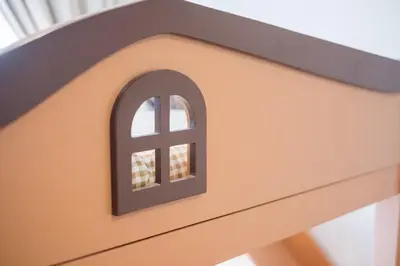 a small building with a window on top of it at Bright 3BR Kids Café Home Slide LEGO Playroom in Kuala Lumpur