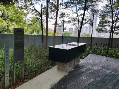 a black bath tub sitting on top of a wooden deck at Robertson S23A KLCC Bukit Bintang Jalan Alor Petaling Street 2R 7Pax in Kuala Lumpur