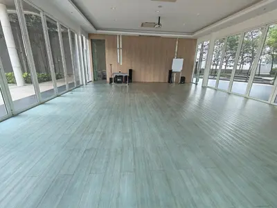 a large room with a wooden floor and large windows at Robertson S23A KLCC Bukit Bintang Jalan Alor Petaling Street 2R 7Pax in Kuala Lumpur