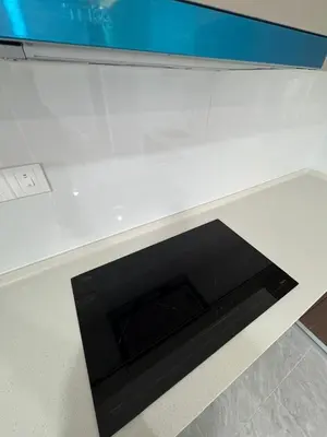 a black object on a white counter top at star resdence in Kuala Lumpur