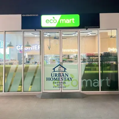 a store with a sign on the door of a store at Urban Homestay Setapak MHP2 Kids Friendly in Kuala Lumpur