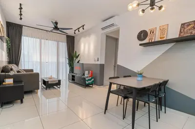 a living room with a table and a couch at Kenwingston Platz 15 MINS TO KLCC Fit 5 Pax With Board games in Kuala Lumpur