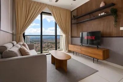 a living room with a tv and a large window at Luxury 3Bedroom Kenwingston Platz 15Mins To KLCC Fit 9Pax A15 in Kuala Lumpur