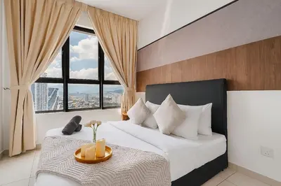 a bedroom with a large bed with a large window at Kenwingston Platz 15Mins To KLCC Fit 9Pax Modern Interior B25 in Kuala Lumpur