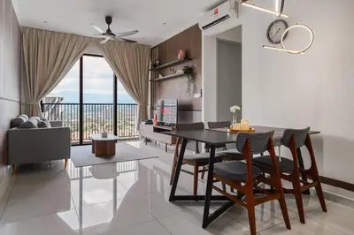 a dining room with a table and chairs in a room at Kenwingston Platz 15MINS TO KLCC Modern Interior Boardgames A26 in Kuala Lumpur