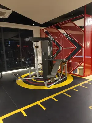 a gym with a treadmill in a building at majestic residence klcc rooftop pool in Kuala Lumpur
