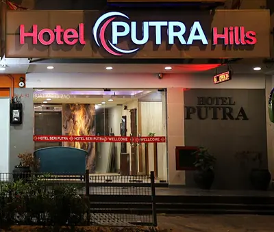a hotel pittima hills sign on the side of a building at Hotel Putra Hills in Kuala Lumpur
