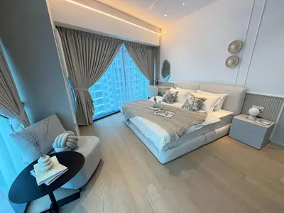 a large bedroom with a bed and a couch at Twin Tower Crush by KF in Kuala Lumpur