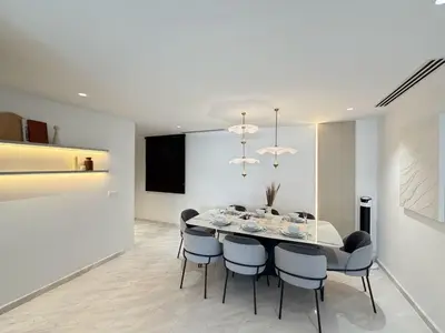 a dining room with a table and chairs at Twin Tower Crush by KF in Kuala Lumpur