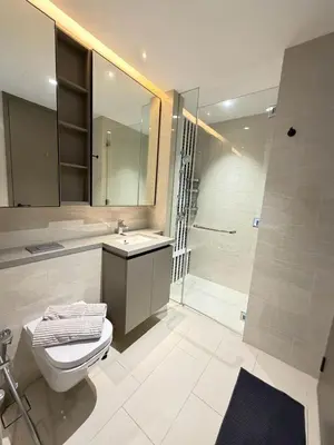 a bathroom with a toilet sink and a shower at Twin Tower Crush by KF in Kuala Lumpur