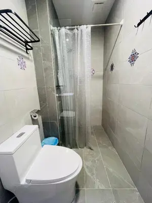 a bathroom with a toilet and a shower at Majestic Residence Kuala lumpur by Luxury in Kuala Lumpur