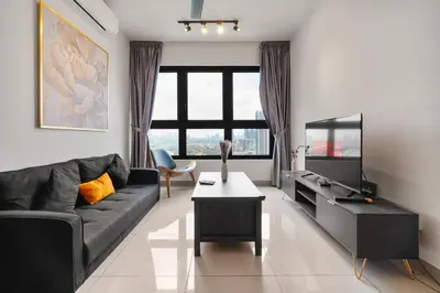 a living room with a couch and a table at M Vertica KLCC View IKEA Velocity in Kuala Lumpur