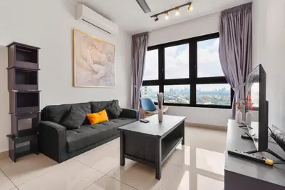 a living room with a couch and a table at M Vertica KLCC View IKEA Velocity in Kuala Lumpur