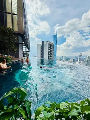 a swimming pool on the roof of a building at Studio Apartment Lucentia Residence in Kuala Lumpur