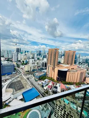 a view of a city with tall buildings at Studio Apartment Lucentia Residence in Kuala Lumpur