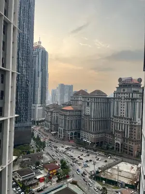 a view of a busy city street with cars at The Mews Klcc by Annie in Kuala Lumpur