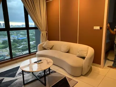 a living room with a couch and a table at Homestay at Trion Kuala Lumpur in Kuala Lumpur
