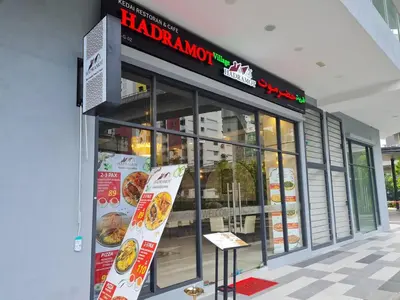 a fast food restaurant with a sign in front of it at Stylish Studio Neu Suites 10 mins to KLCC in Kuala Lumpur