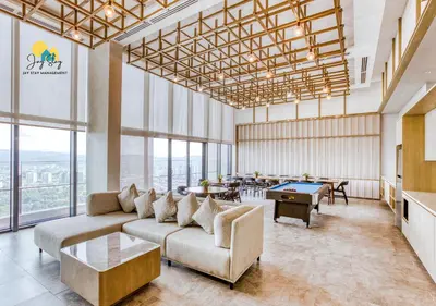 a living room with a couch and a pool table at Agile Residence l 5 mins to TRX l Pavillion l Bukit Bintang l KLCC l Games Room l 4-7pax l City Centre by Jay Stay Management in Kuala Lumpur