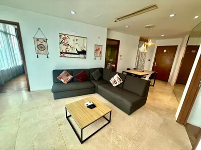 a living room with a couch and a table at Kuala-lumpur City View Vortex Apartment in Kuala Lumpur
