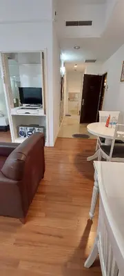 a living room with a couch and a table at KL Brave Suite at Times Square in Kuala Lumpur