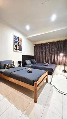 a bedroom with two beds and a couch at Cozy 2 Private Rooms in Taman Desa with Shared Bathroom in Kuala Lumpur