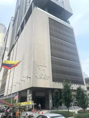 a large building with a akron sign on it at Axon Suites near at Pavilion with Rooftop Panoramic City View in Kuala Lumpur